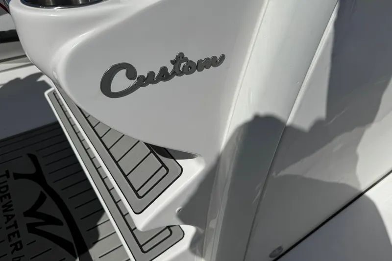 Slide: The Image of 2025 Tidewater 282 CC Adventure boat with custom detailing and logo. - 33