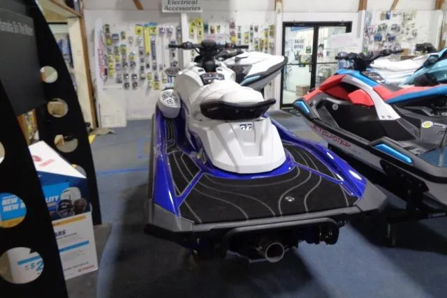 Slide: The Image of 2025 Yamaha WaveRunner GP1800R SVHO in showroom, rear view, blue and white design. - 17