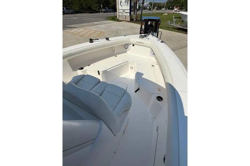 Slide: The Image of 2016 Everglades 255 Center Console boat interior with seating and storage compartments. - 11