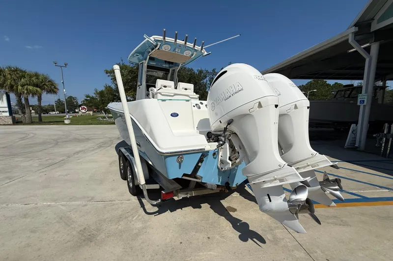 Slide: The Image of 2016 Everglades 255 Center Console boat with twin Yamaha engines on trailer. - 5