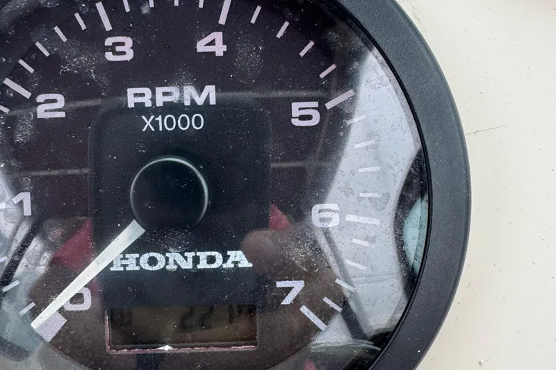 Slide: The Image of Close-up of a Honda RPM gauge on a 1996 Parker 2110 Walkaround boat. - 5