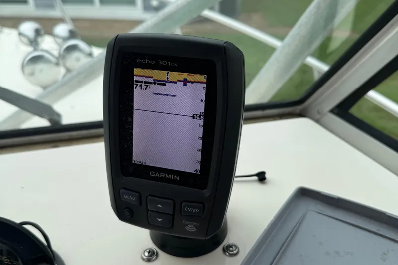 Slide: The Image of Garmin echo 301dv fishfinder on 1996 Parker 2110 Walkaround boat dashboard. - 6