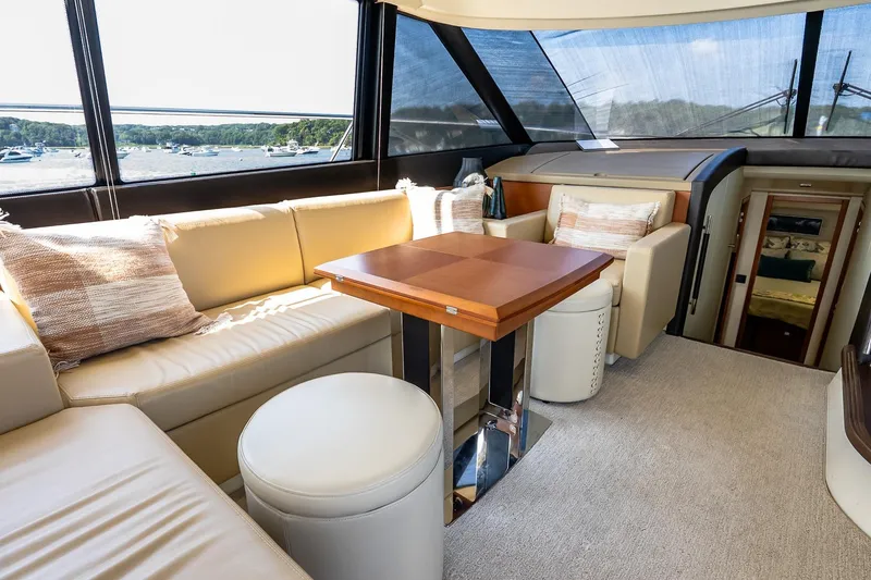Slide: The Image of Luxurious interior of 2014 Prestige Yachts 550 Flybridge with elegant seating and scenic views. - 43
