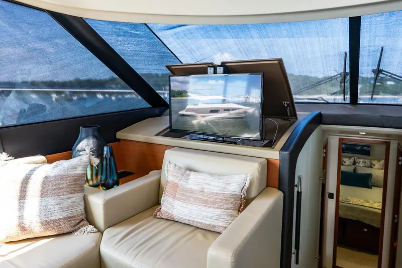 Slide: The Image of Luxurious interior of 2014 Prestige Yachts 550 Flybridge with plush seating and modern decor. - 49