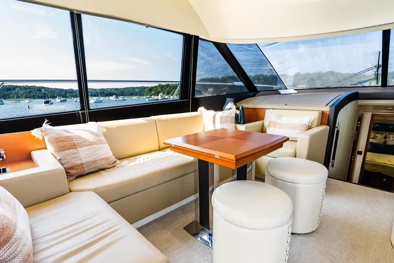 Slide: The Image of Luxurious interior of 2014 Prestige Yachts 550 Flybridge with scenic water view. - 51