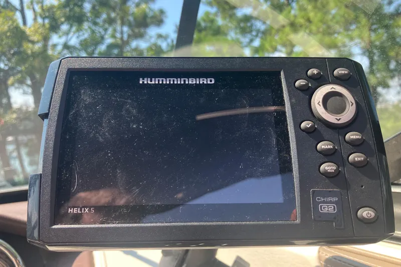 Slide: The Image of Humminbird Helix 5 fish finder on 2013 Sea Ray 210 SLX boat dashboard. - 23