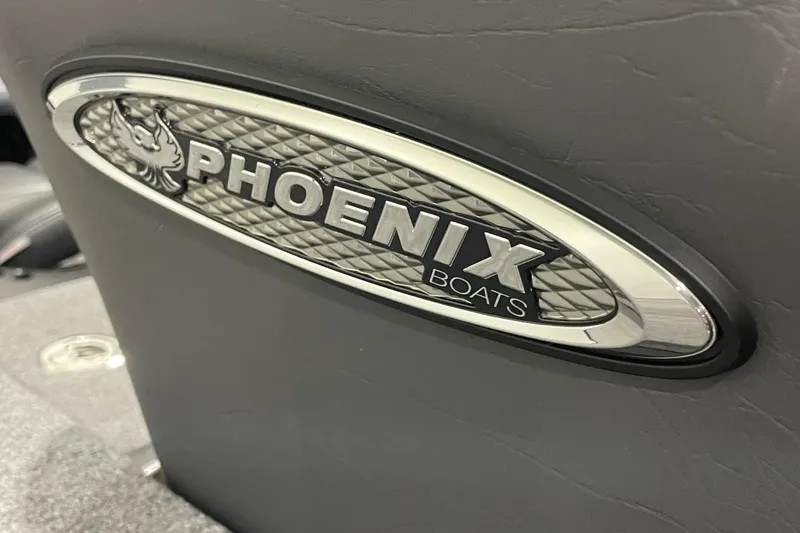 Slide: The Image of Close-up of 2021 Phoenix 21 PHX boat logo on dark surface. - 14