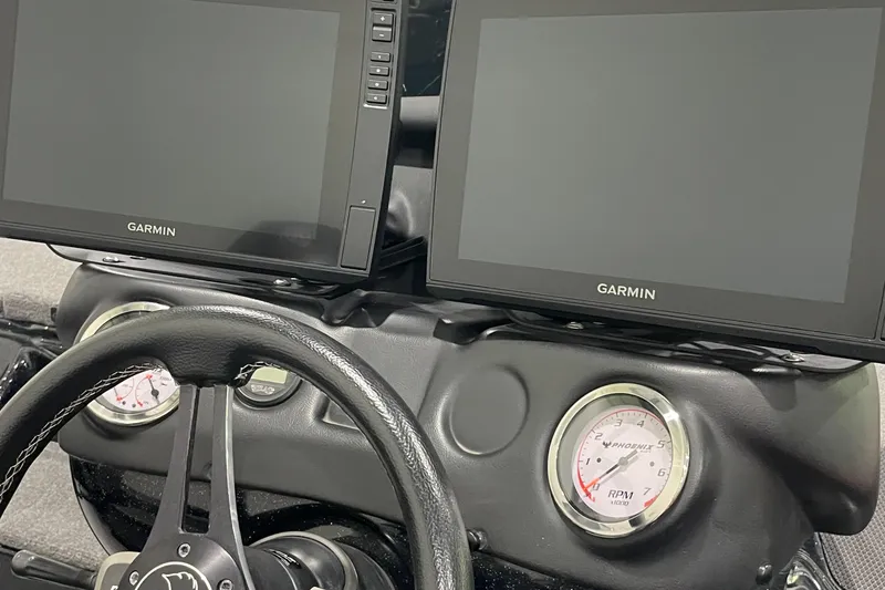 Slide: The Image of Dashboard of 2021 Phoenix 21 PHX with Garmin displays and RPM gauge. - 15