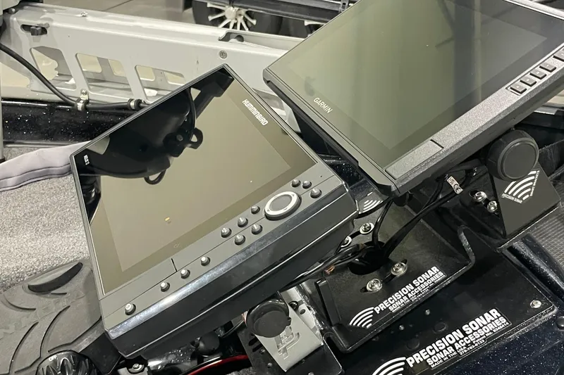 Slide: The Image of Dual sonar displays on a 2021 Phoenix 21 PHX boat dashboard. - 4