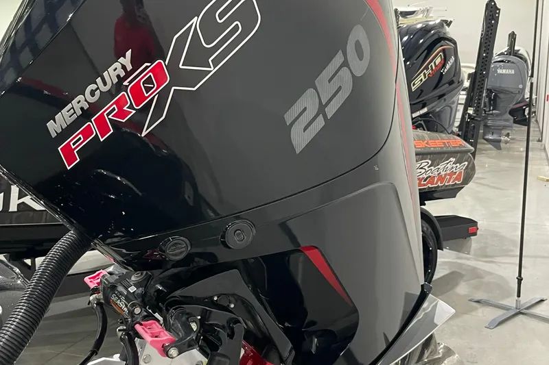 Slide: The Image of Mercury Pro XS 250 engine on 2021 Phoenix 21 PHX boat in showroom. - 9