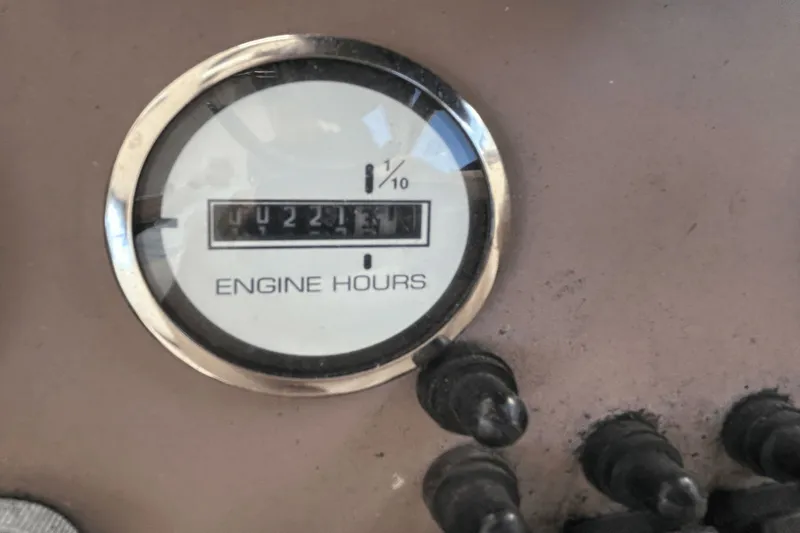 Slide: The Image of Engine hour meter on 2005 Regal Commodore 4260, displaying 2213.4 hours. - 12