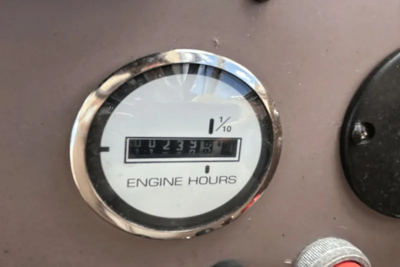 Slide: The Image of Engine hour meter on 2005 Regal Commodore 4260, displaying 233.6 hours. - 13