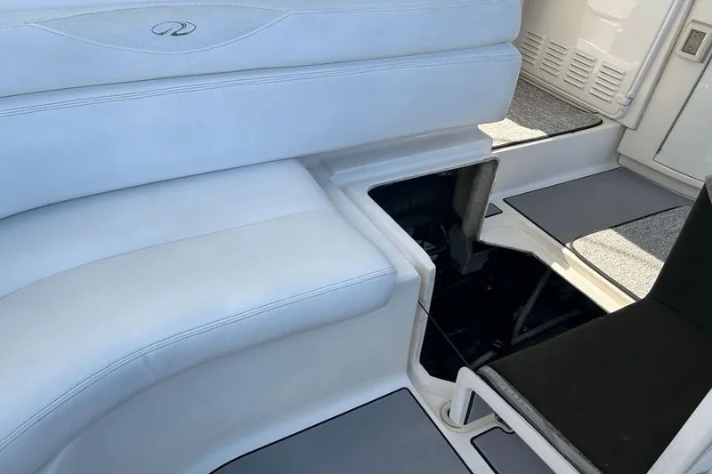 Slide: The Image of 2005 Regal Commodore 4260 interior seating with storage compartment open. - 37