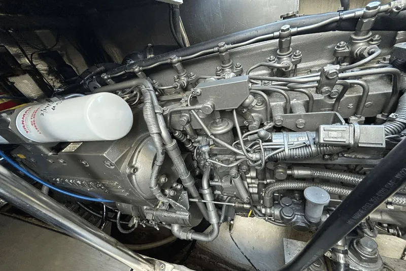 Slide: The Image of Engine of a 2005 Regal Commodore 4260 boat, showcasing intricate mechanical components. - 39