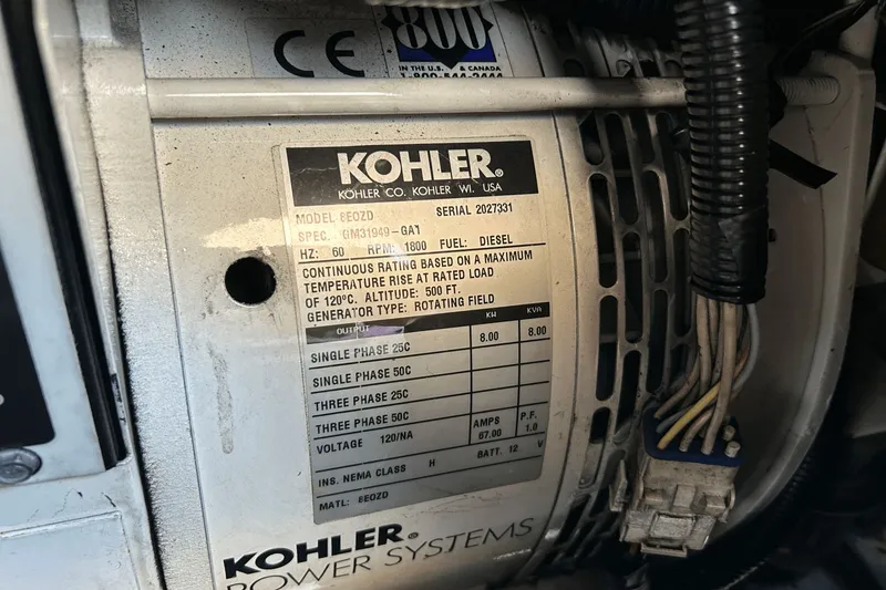Slide: The Image of Kohler generator label on Regal Commodore 4260, 2005 model, showing specifications and wiring. - 41
