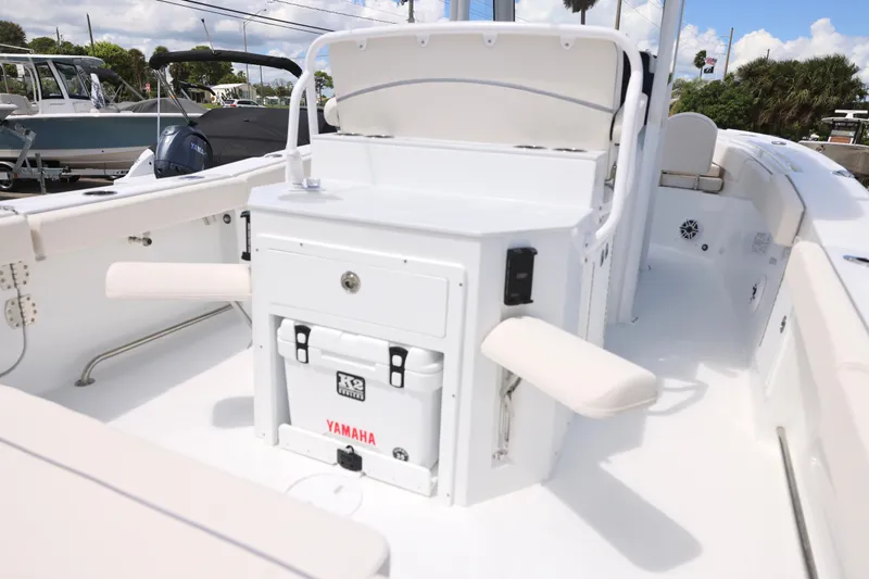 Slide: The Image of 2026 Sea Hunt Ultra 275 SE boat interior, showcasing sleek white seating and modern design. - 17