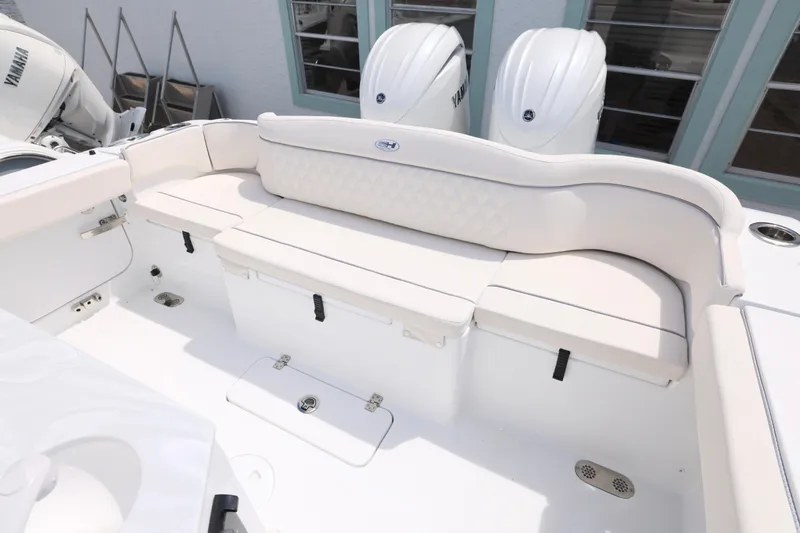 Slide: The Image of 2026 Sea Hunt Ultra 275 SE boat with spacious seating and sleek design. - 2