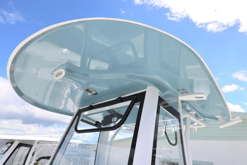 Slide: The Image of 2026 Sea Hunt Ultra 275 SE boat dashboard with Garmin navigation system. - 26