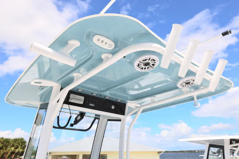 Slide: The Image of 2026 Sea Hunt Ultra 275 SE boat interior with seating and storage features. - 5