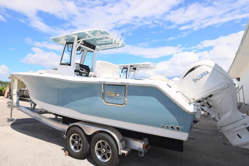 Slide: The Image of 2026 Sea Hunt Ultra 275 SE boat console with Garmin navigation system. - 6