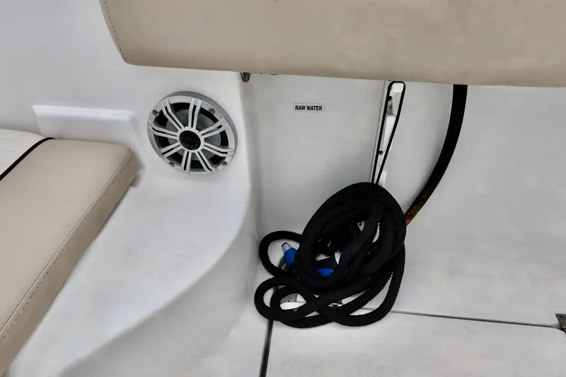 Slide: The Image of 2018 Sea Fox 266 Commander boat interior with speaker and coiled rope. - 14