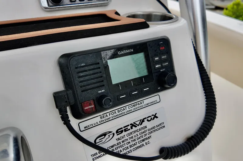 Slide: The Image of Garmin marine radio on 2018 Sea Fox 266 Commander boat dashboard. - 17