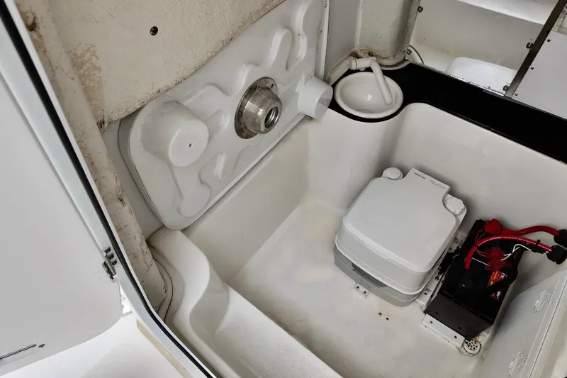 Slide: The Image of Interior of 2018 Sea Fox 266 Commander boat with portable toilet and sink. - 21