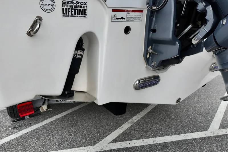 Slide: The Image of Rear view of 2018 Sea Fox 266 Commander boat with warranty sticker. - 6