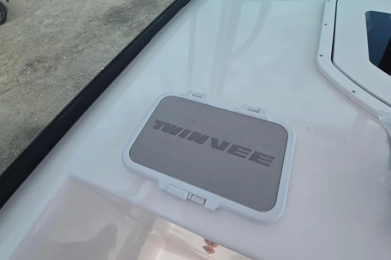 Slide: The Image of 2020 Twin Vee 240 DC GF boat deck with branded hatch cover. - 46