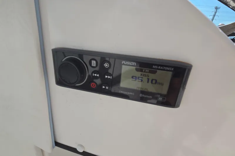 Slide: The Image of Fusion MS-RA70NSX radio on 2020 Twin Vee 240 DC GF boat, tuned to 95.1 FM. - 47