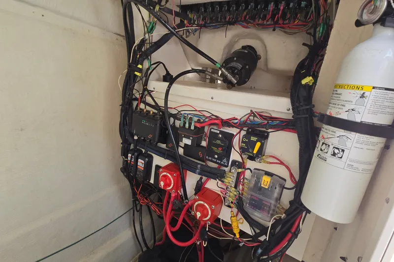 Slide: The Image of Electrical system of a 2020 Twin Vee 240 DC GF boat, featuring wiring and components. - 49