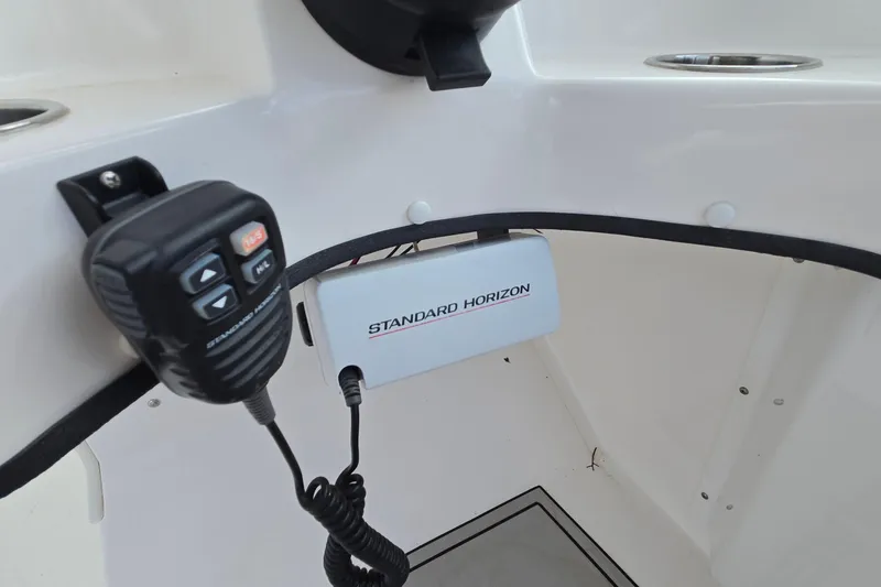 Slide: The Image of 2020 Twin Vee 240 DC GF boat with Standard Horizon marine radio equipment. - 54