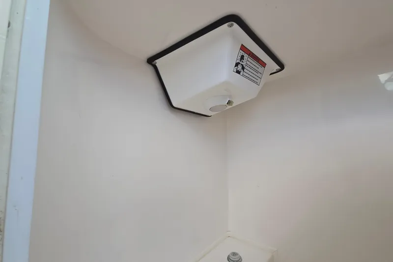 Slide: The Image of 2020 Twin Vee 240 DC GF boat interior detail with mounted equipment. - 56