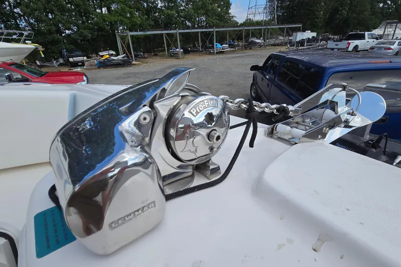 Slide: The Image of Chrome anchor windlass on 2020 Twin Vee 240 DC GF boat, parked outdoors. - 61