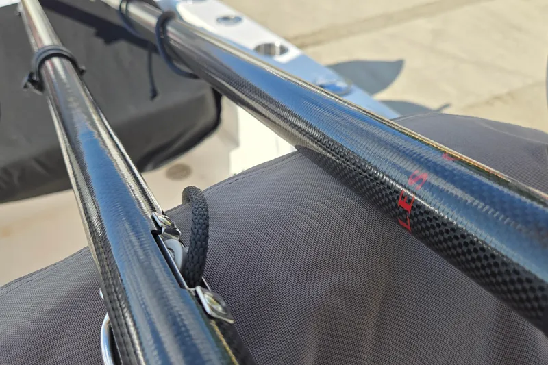 Slide: The Image of Close-up of fishing rods on a 2020 Twin Vee 240 DC GF boat. - 72