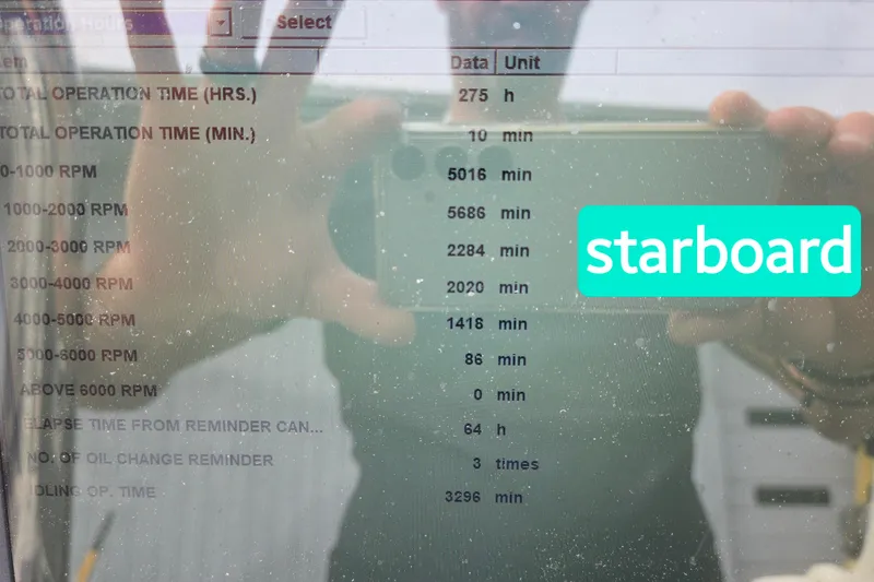 Slide: The Image of Display screen showing engine operation data for 2020 Twin Vee 240 DC GF boat. - 73