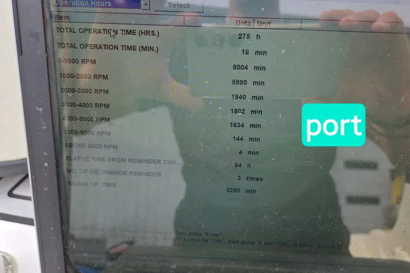 Slide: The Image of Display screen showing engine operation data for 2020 Twin Vee 240 DC GF boat. - 74