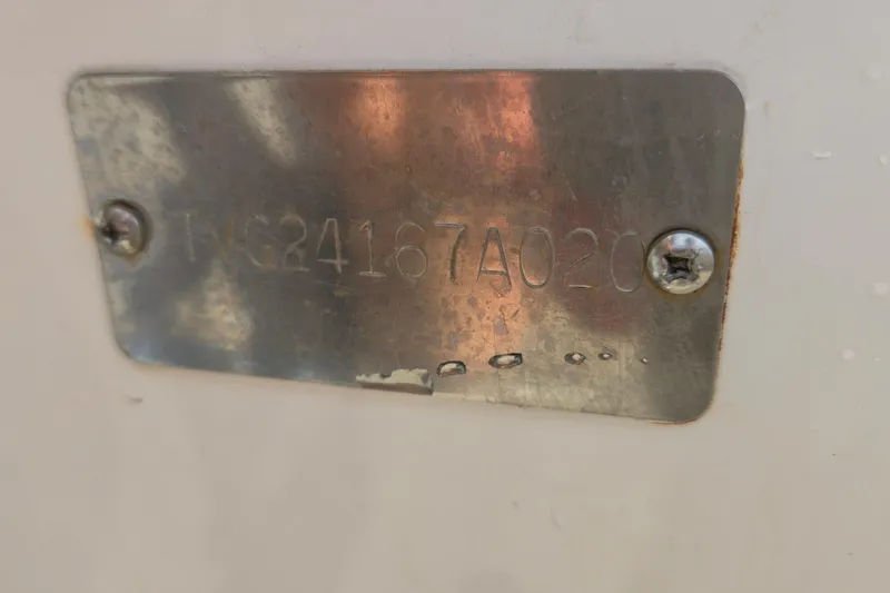 Slide: The Image of Metal identification plate on 2020 Twin Vee 240 DC GF boat. - 83