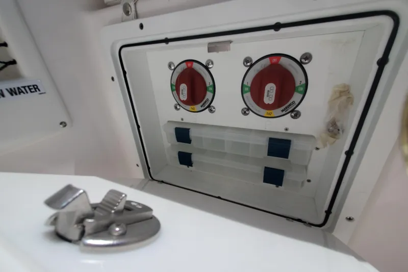 Slide: The Image of 2024 Sea Fox 268 Traveler control panel with switches and dials. - 22