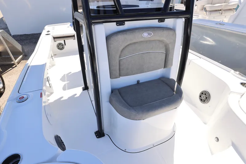 Slide: The Image of 2026 Sea Hunt BX 22 BR boat interior with gray cushioned seating and sleek design. - 19