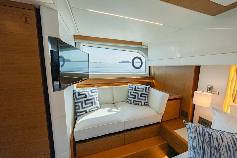 Slide: The Image of Luxurious interior of 2022 Tiara Yachts Coupe with elegant seating and ocean view. - 15