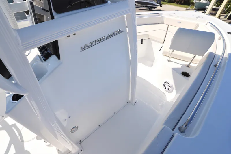 Slide: The Image of 2026 Sea Hunt Ultra 229 boat interior with seating and console details. - 15