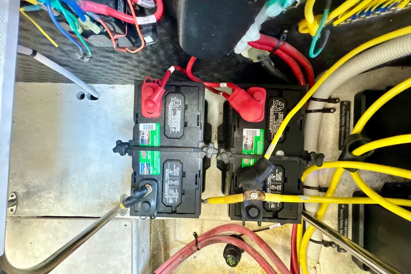 Slide: The Image of Battery compartment of 2017 Chaparral 337 SSX with wiring and connections. - 33