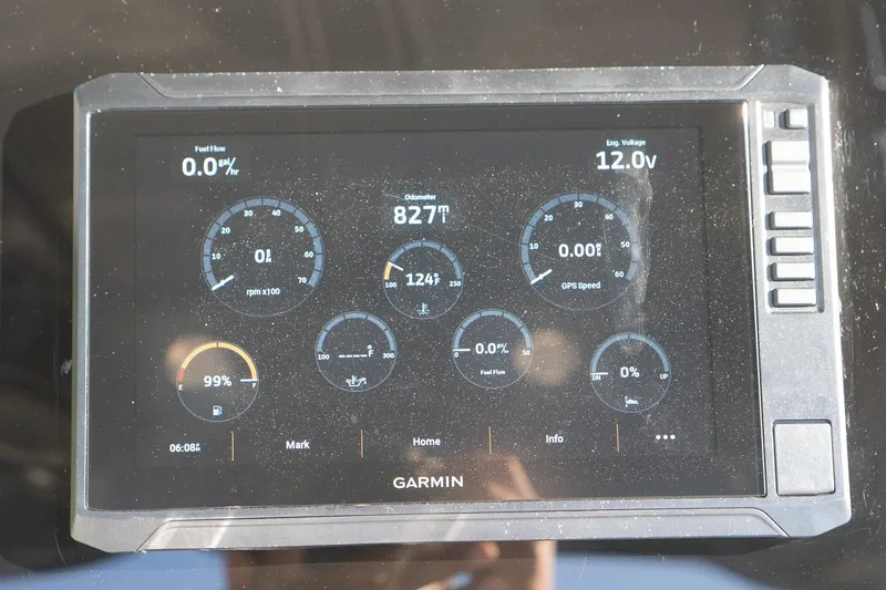 Slide: The Image of Garmin display on 2021 Sea Chaser 26 LX showing engine and navigation data. - 15
