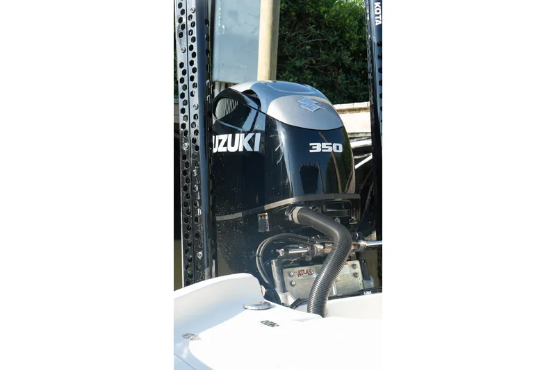 Slide: The Image of 2021 Sea Chaser 26 LX with Suzuki 350 outboard motor, close-up view. - 20