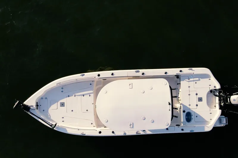 Slide: The Image of Aerial view of 2021 Sea Chaser 26 LX boat on dark water. - 42