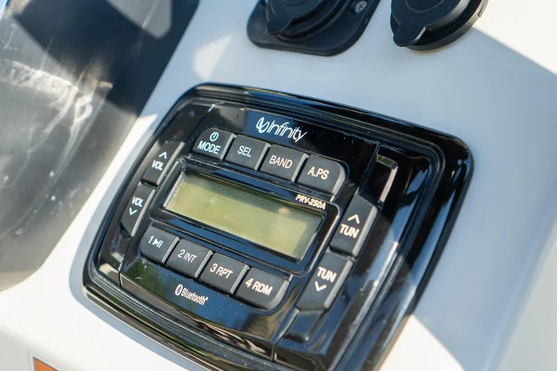 Slide: The Image of Infinity audio system on 2021 Sea Chaser 26 LX boat dashboard. - 7