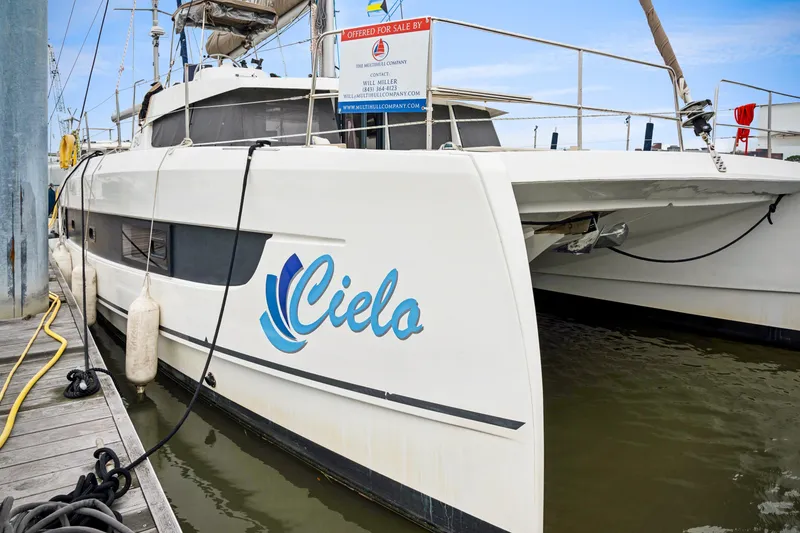 Slide: The Image of 2023 Bali 4.2 catamaran named "Cielo" docked, available for sale. - 11