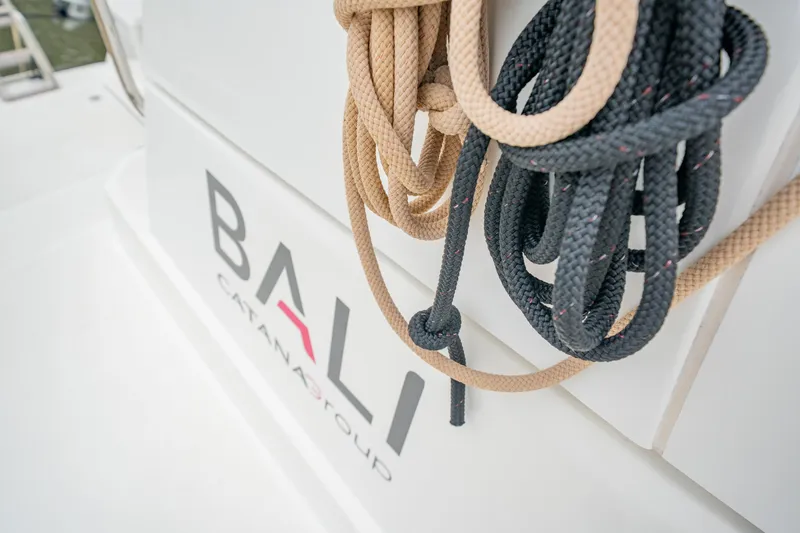 Slide: The Image of Close-up of ropes on a 2023 Bali 4.2 catamaran, featuring the Bali Catana Group logo. - 14