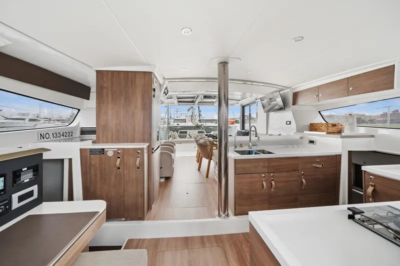 Slide: The Image of Luxurious interior of 2023 Bali 4.2 yacht with modern kitchen and seating area. - 47